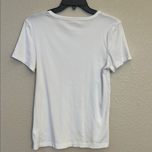 Women large Amazon tops in white and black. One top has a wider neckline. - Picture 6 of 14